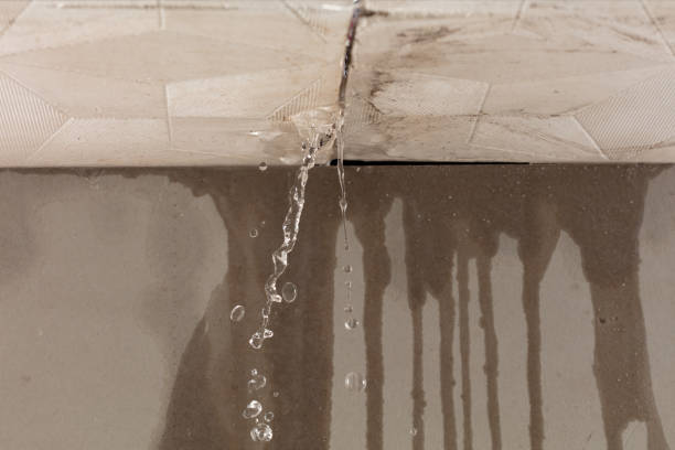 Professional Flood Damage Cleanup technician working in Shannock, RI